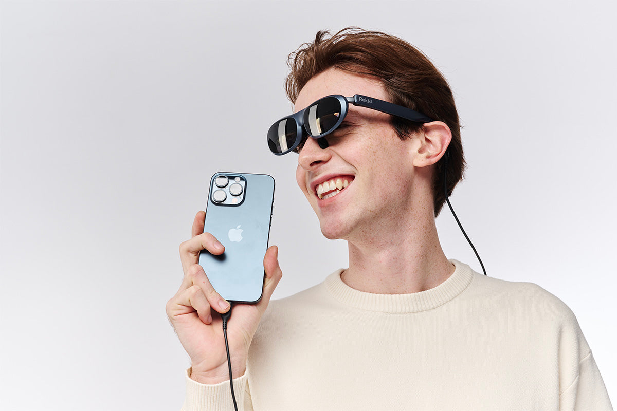 a_man_with_Rokid_AR_glasses_71c0da3d-e45c-4d87-8246-2d39fee81b67_1920x